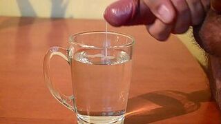 Cumming into glass of water - porn video
