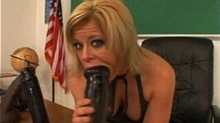 Busty teacher Kylee filling her pussy with a huge dildo - porn video